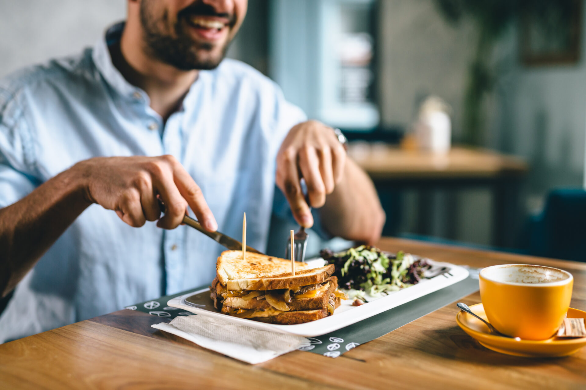 a photo of a man eating dinner, for the article about top tips on digestion