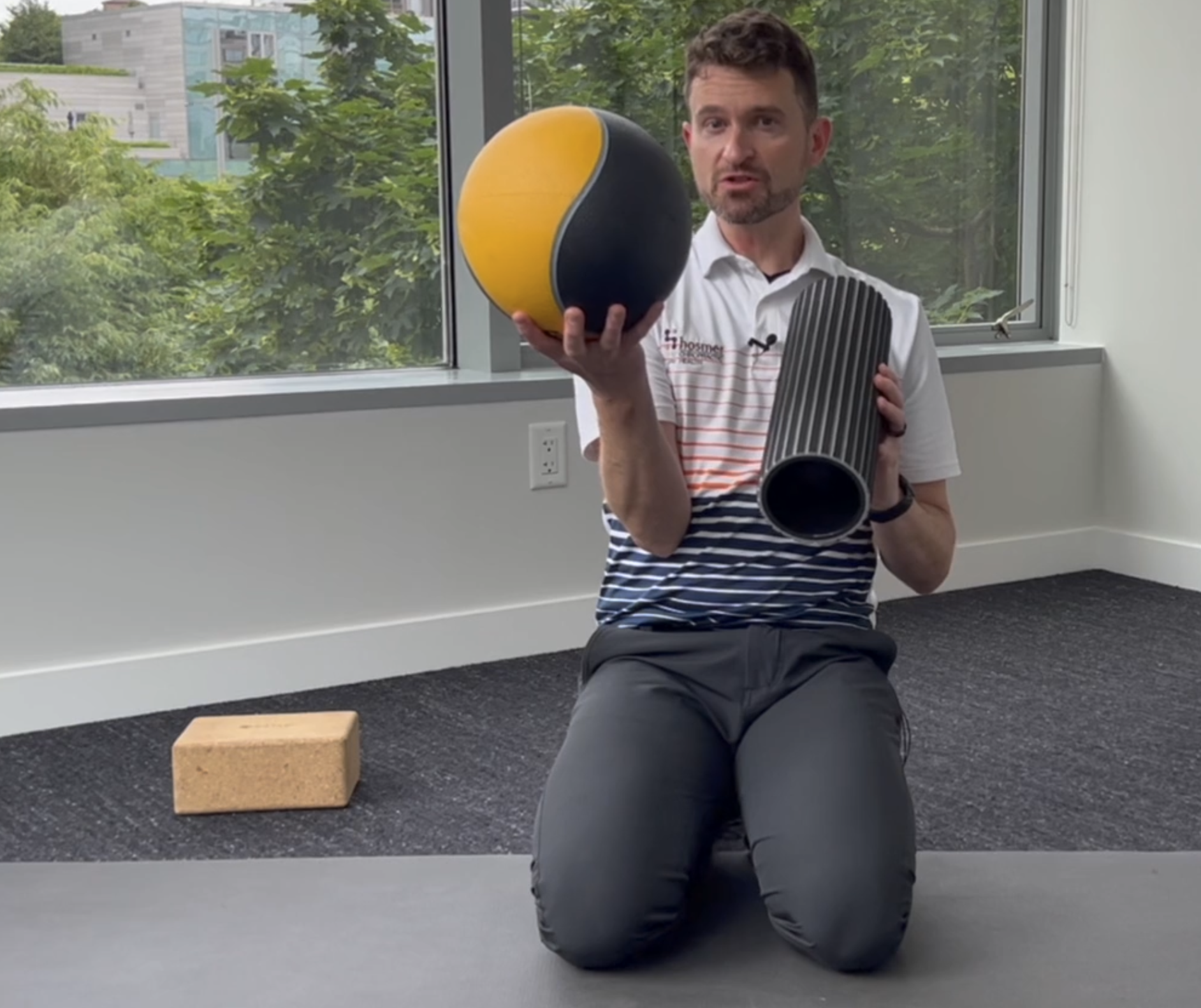 Dr. Seth Hosmer, DC conducting a medicine ball demonstration.